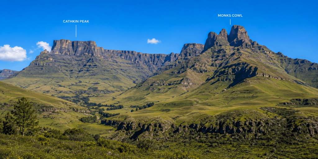 Cathkin Peak and Monk’s Cowl rising above the green Champagne Valley in the Central Drakensberg, KwaZulu-Natal, South Africa